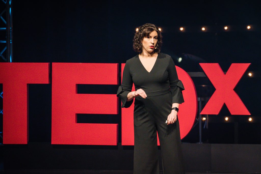 Dr. Alison Escalante speaking at TEDx Naperville on The Parenting "ShouldStorm"