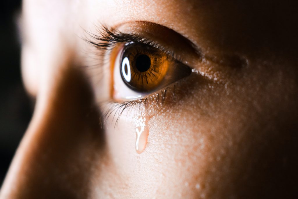 Woman with tear in her eye